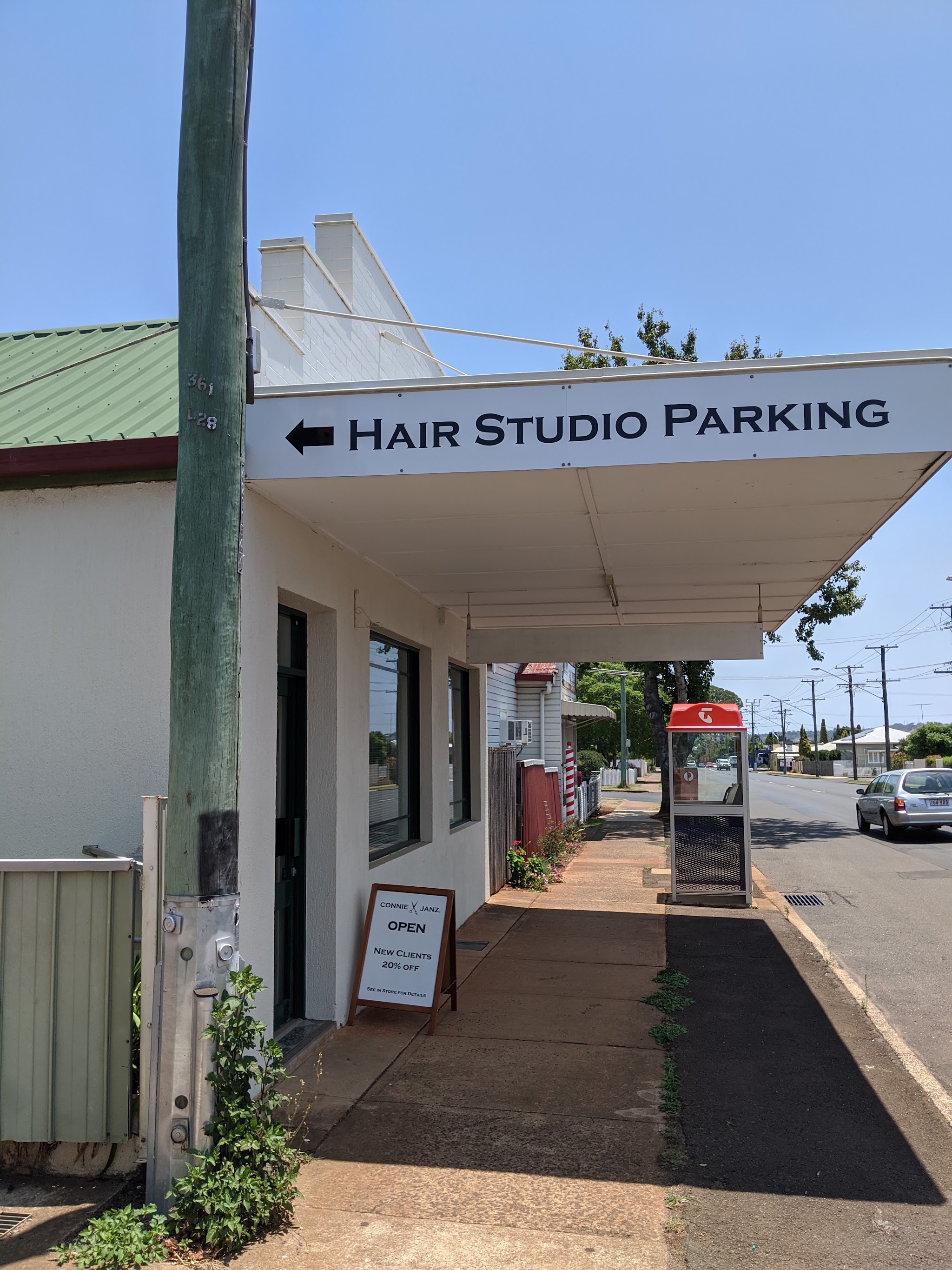 The studio's shopfront on Holberton Street with the Hair Studio Parking awning sign